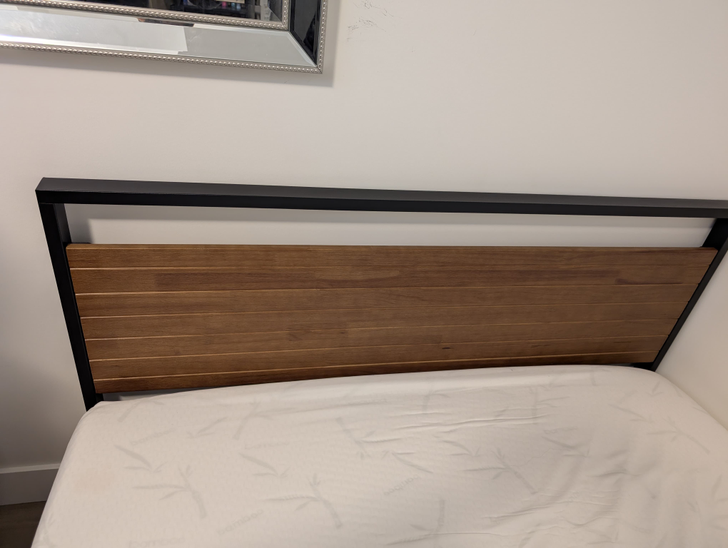 Queen bed with mattress and 2 side table.