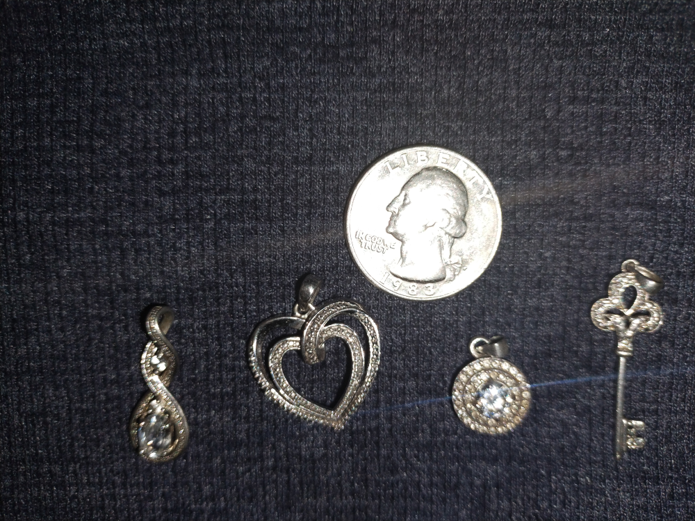 four 925 Silver Pendant sold as set - photo 3