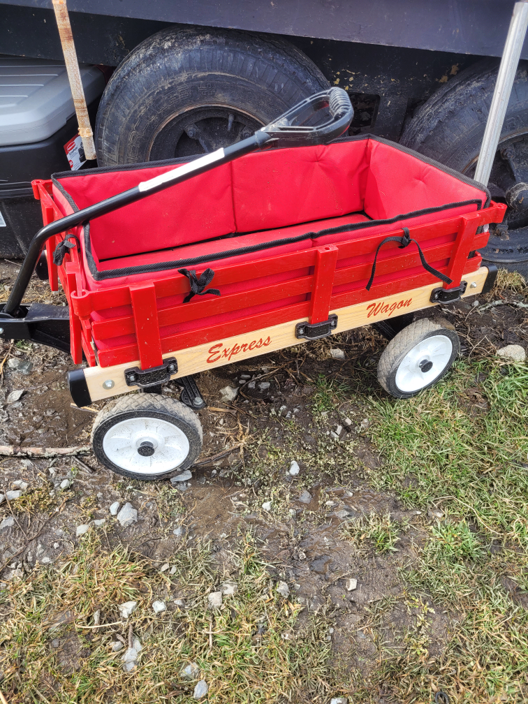 Red Radio Flyer-style wagon