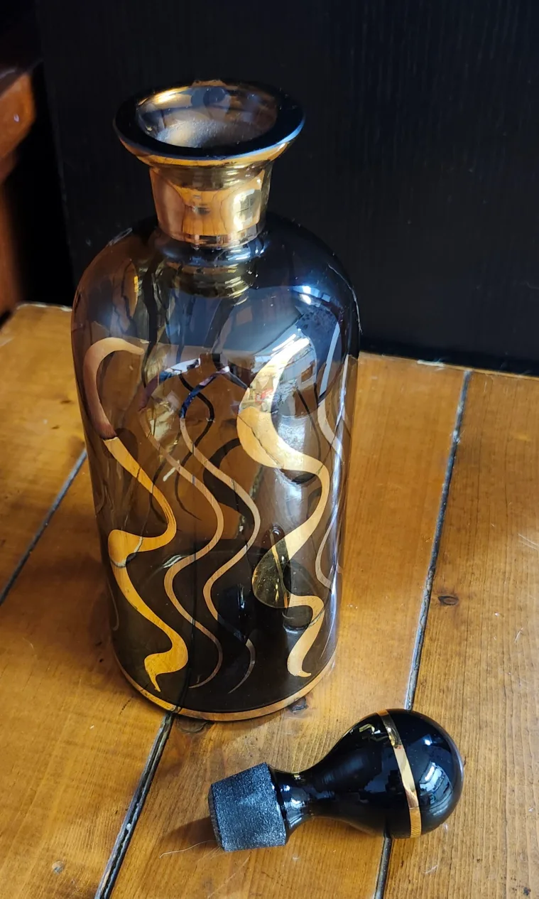 Vintage Glass Decanter with Gold Accents image indicator(2)