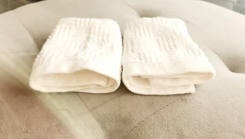 Trio of White Textured Washcloths image indicator(6)