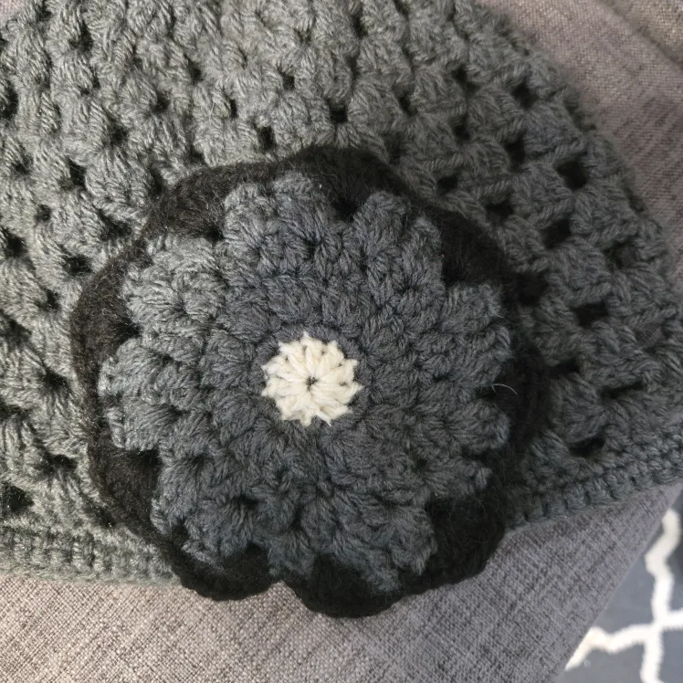 Handmade Crochet Beanie with Flower Detail image indicator(3)