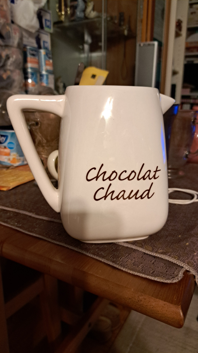 White ceramic hot chocolate pitcher