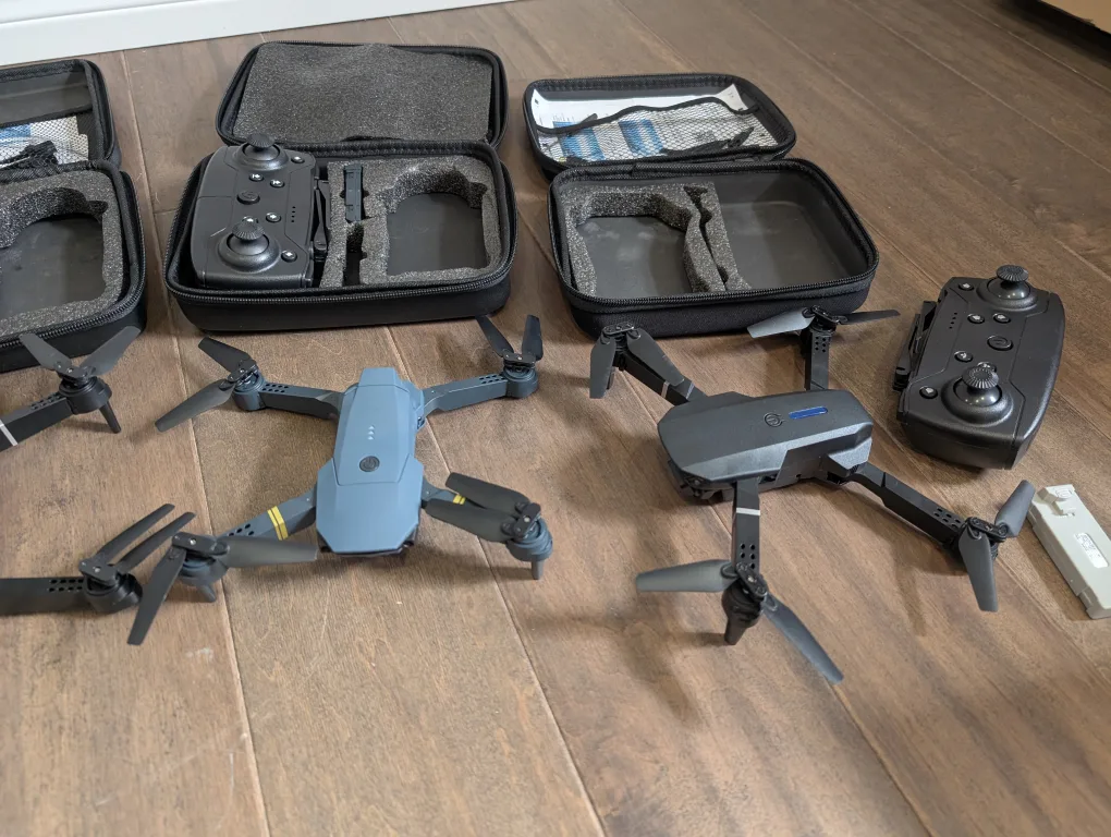 Brand New Drones with Cases and Controllers image indicator(6)
