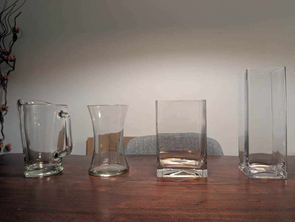 Set of Four Clear Glass Vases and Pitcher