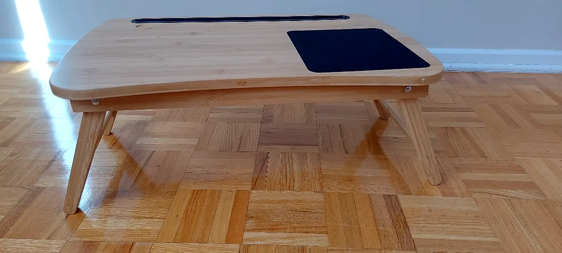 Portable bamboo laptop table. Features a phone/tablet holder image indicator(3)