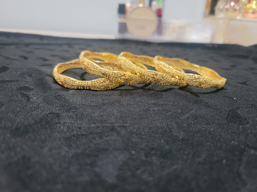 Gold-toned Bangles Set of Four - photo 2