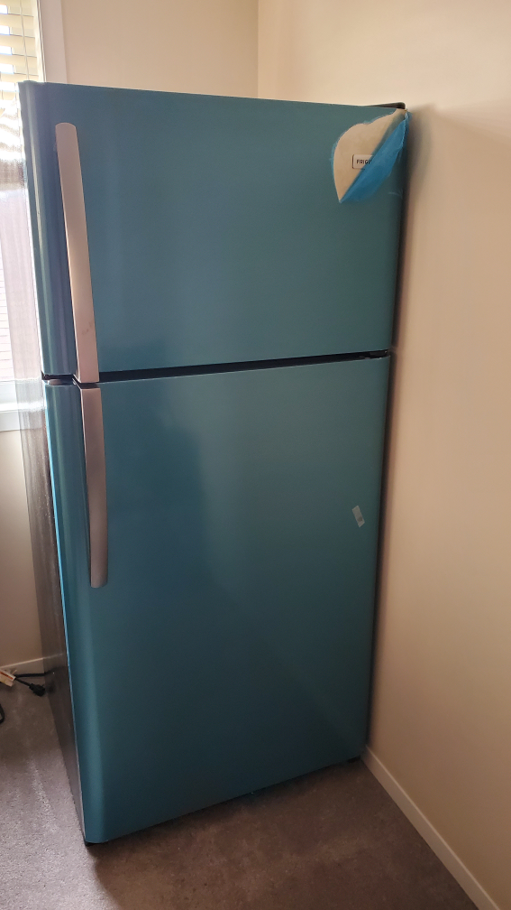 Fridge with top freezer
