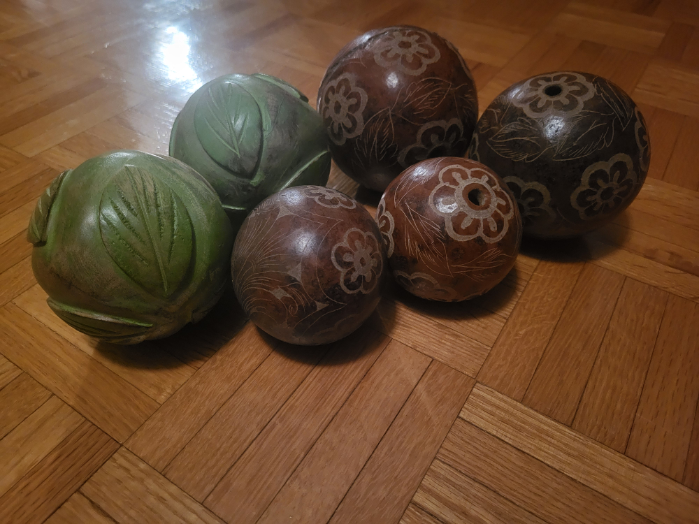 Set of six decorative carved spheres