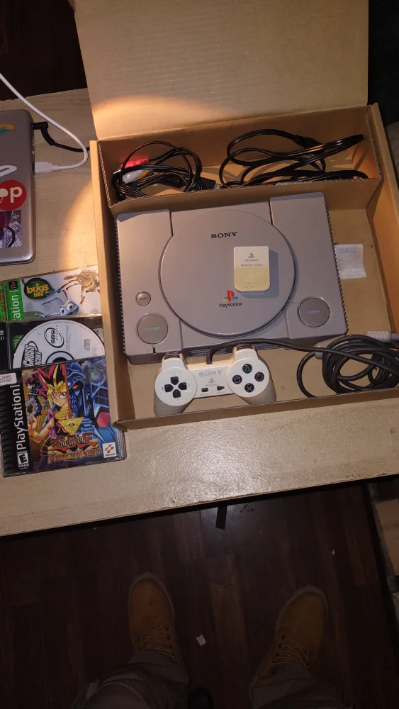 PlayStation One w/ controller and 4 games thumbnail