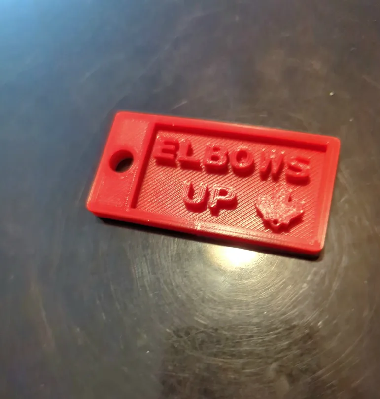 Elbows Up Keychain - 3D Printed in Kingston image indicator(3)