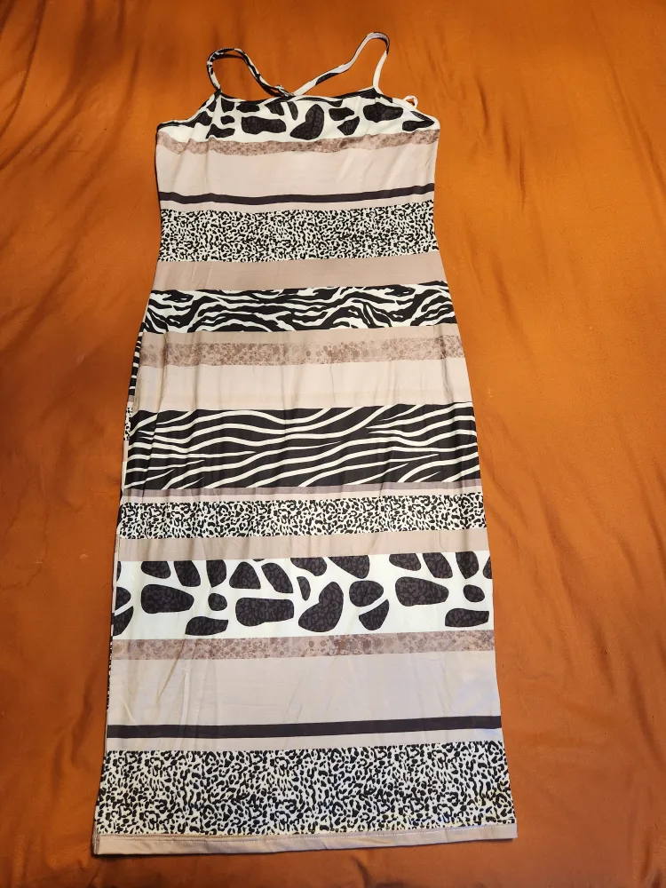 Women's Clothing Bundle: Jumpsuit, Sweater, and Dresses image indicator(4)