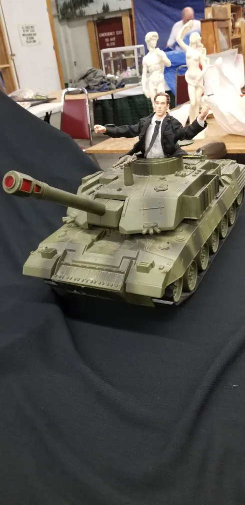 Business man riding a tank ( war is profitable  ) 1986 image indicator(6)