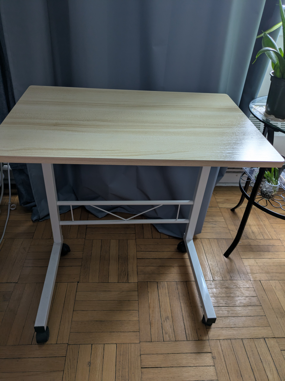 Mobile adjustable height table. Mint condition
