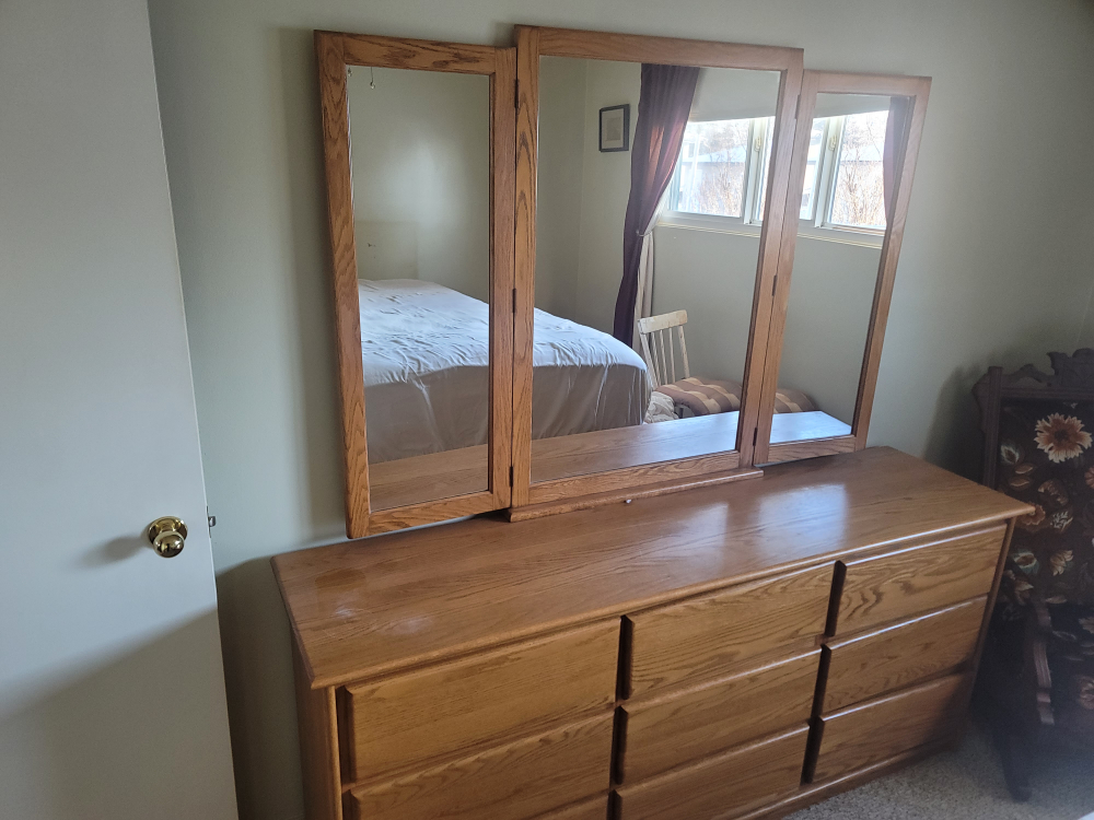 Oak dresser with tri-fold mirror
