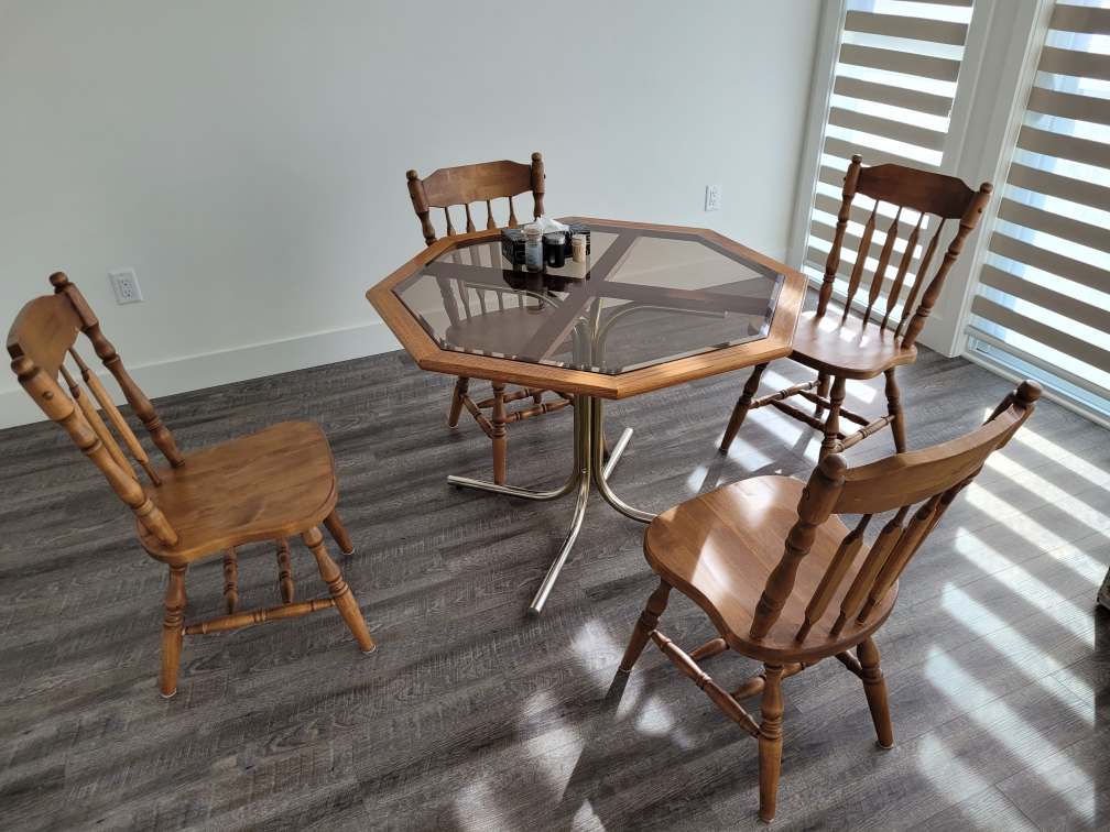 Glass Top Dining Table with Four Chairs