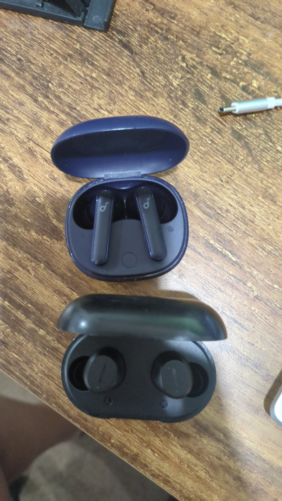 Pair of Wireless Earbuds & Charging Cases - photo 2