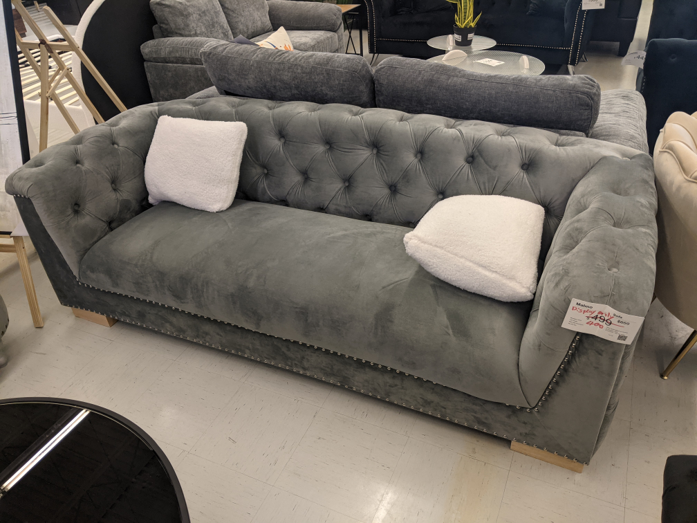floor model velvet sofa