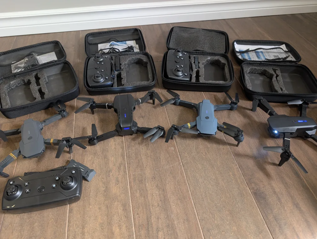 Brand New Drones with Cases and Controllers image indicator(7)