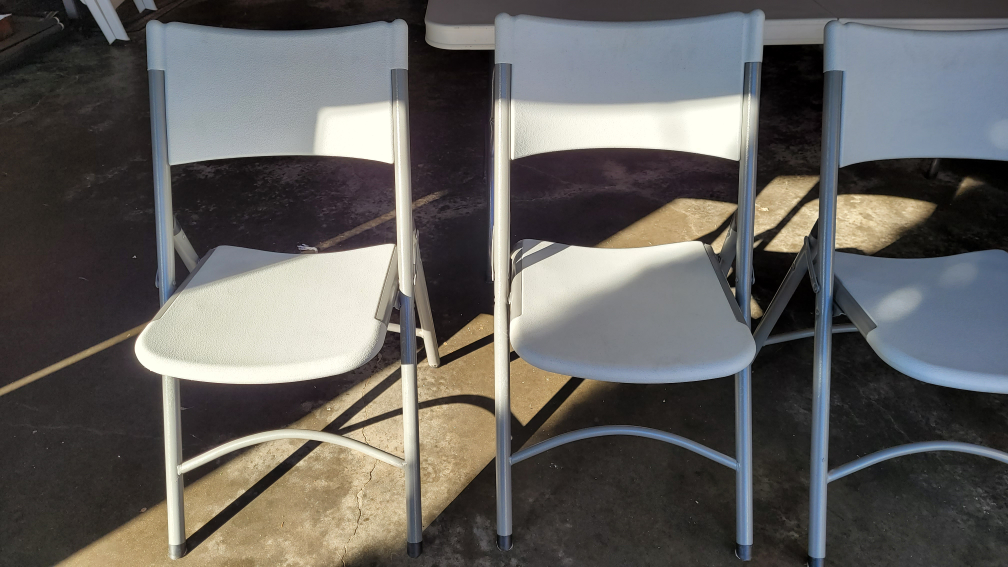 Four Resin Folding Chairs - photo 2
