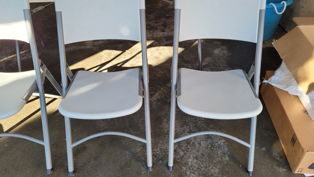 Four Resin Folding Chairs - photo 3