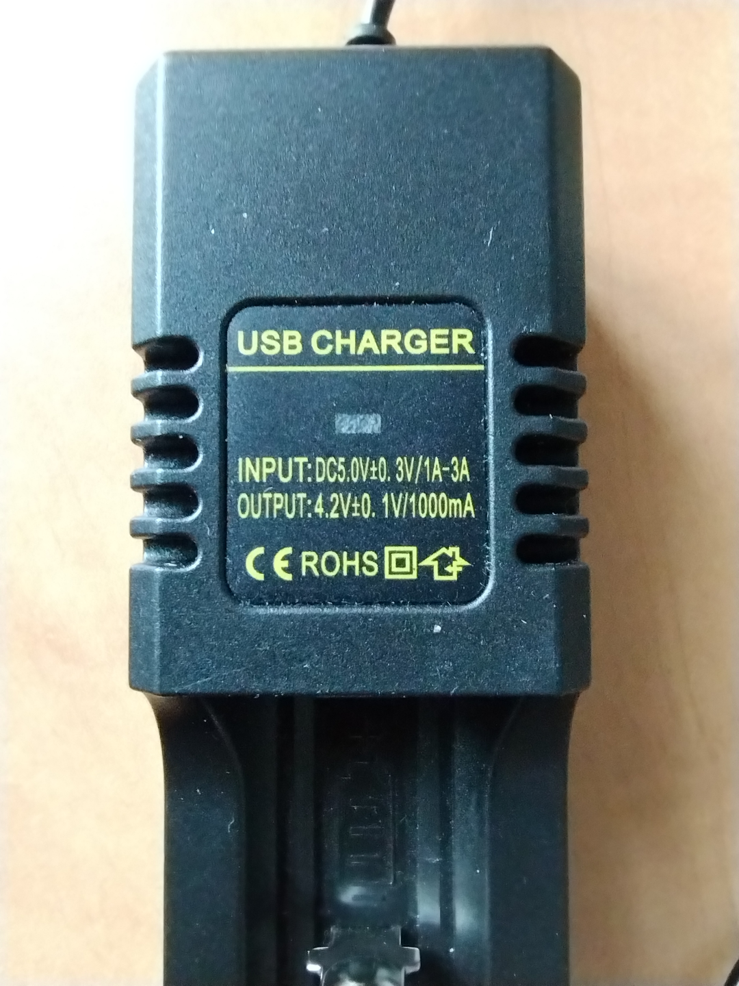 Lithium Rechargeable Battery Charger & cord & adapter.