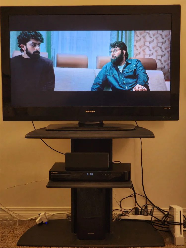 Sharp TV with Samsung Soundbar and Stand thumbnail