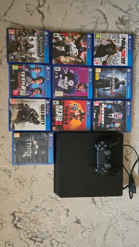 PlayStation 4 Console with 10 Games and Controller thumbnail
