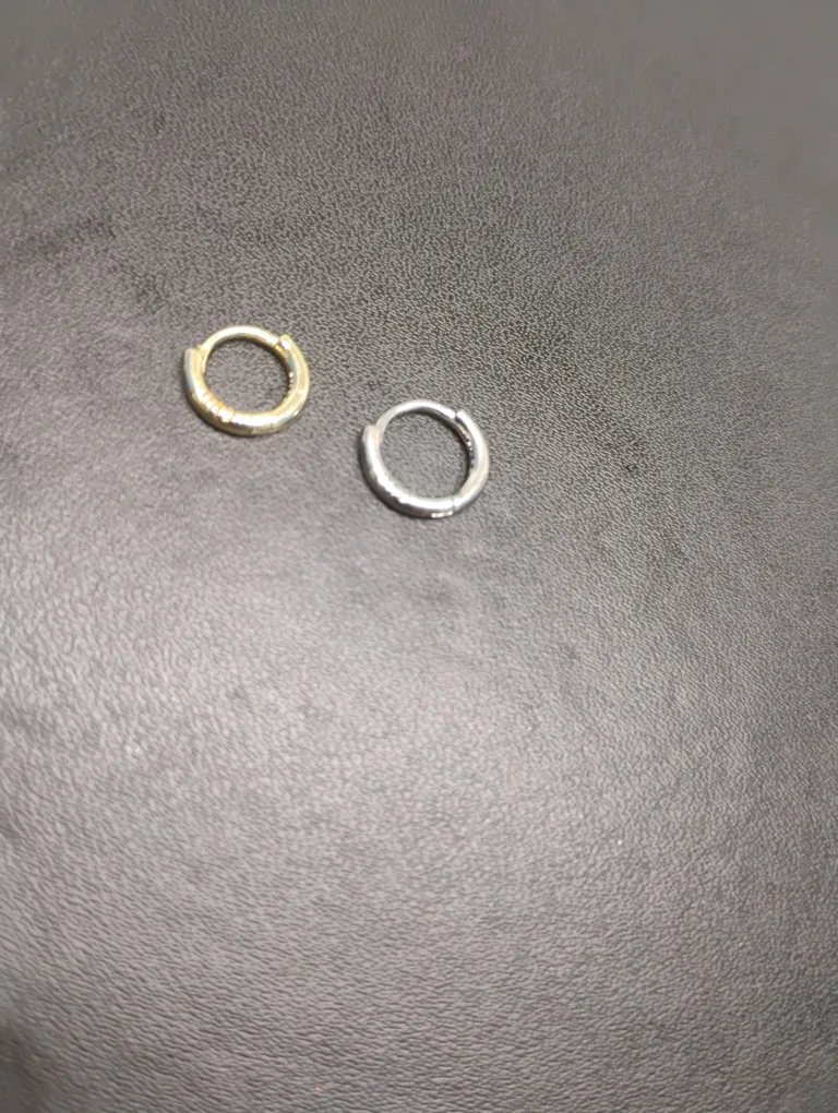 Pair of Small Gold and Silver Huggie Earrings image indicator(2)