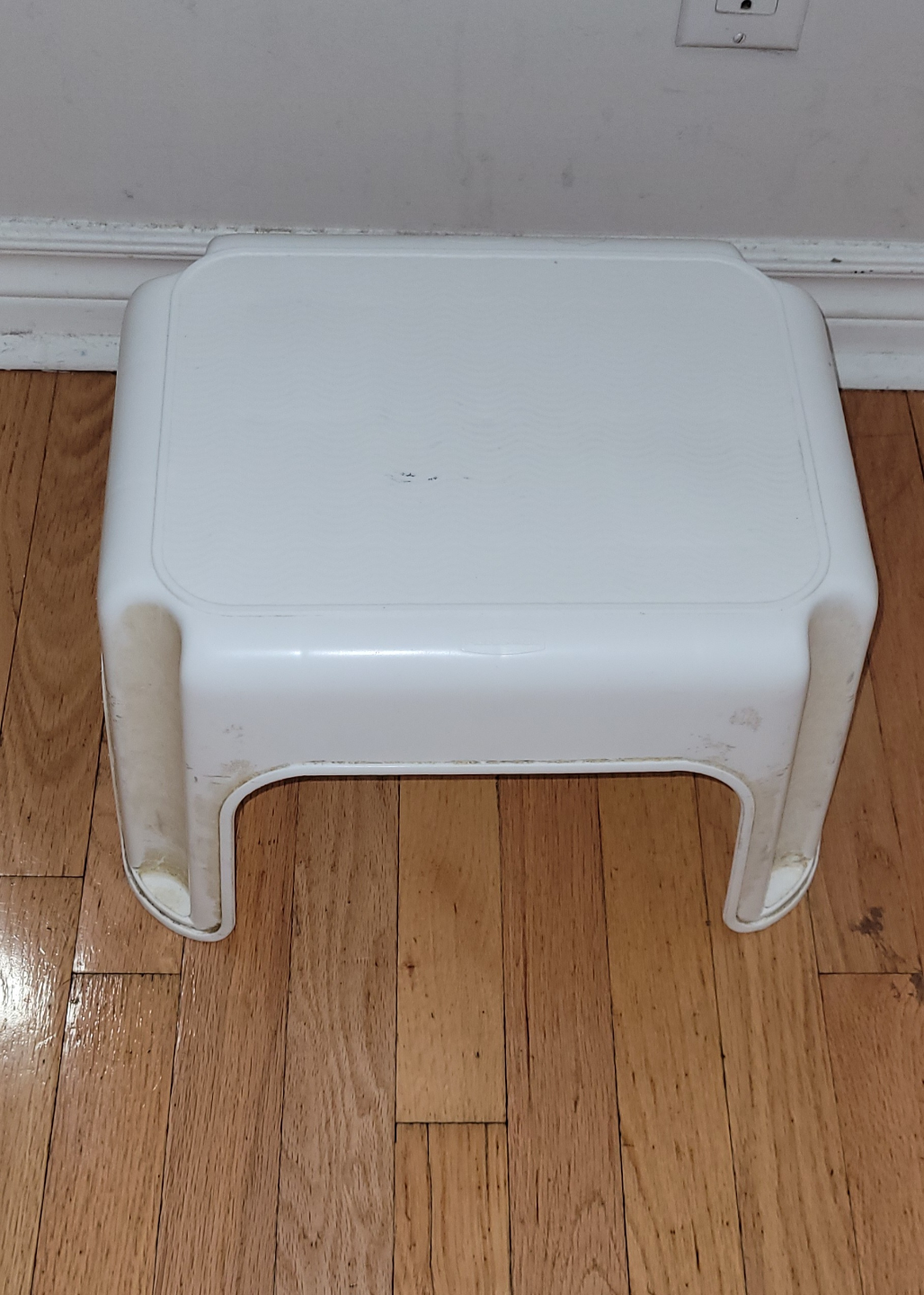 White plastic step stool