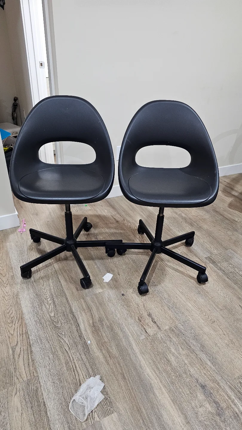 Pair of Black Swivel Rolling Chairs thumbnail