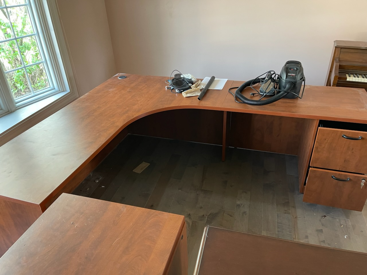 desk with shelf, another desk. 2 wooden cabinets