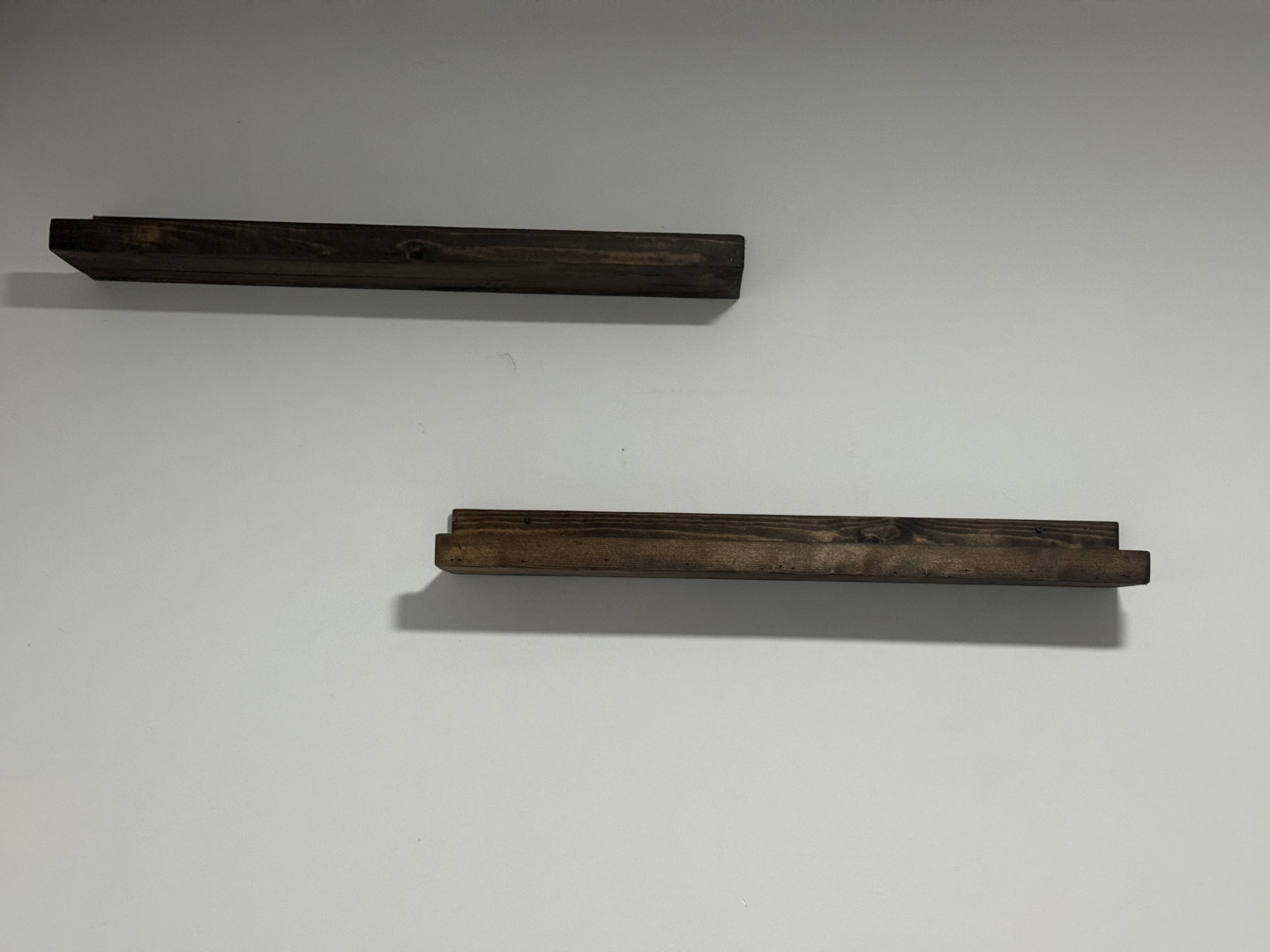 Two Rustic Dark Brown Wooden Floating Shelves
