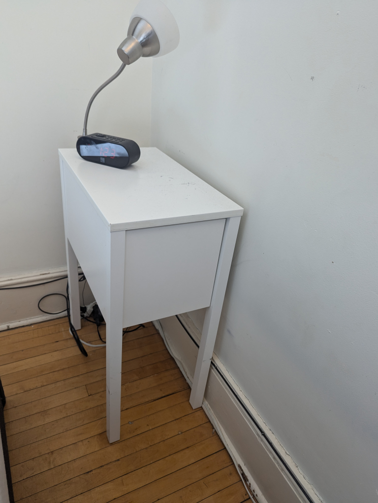 White bedside table with drawer