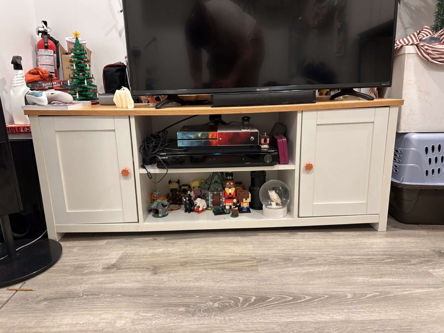 White TV Stand with Two Cabinets and Shelf