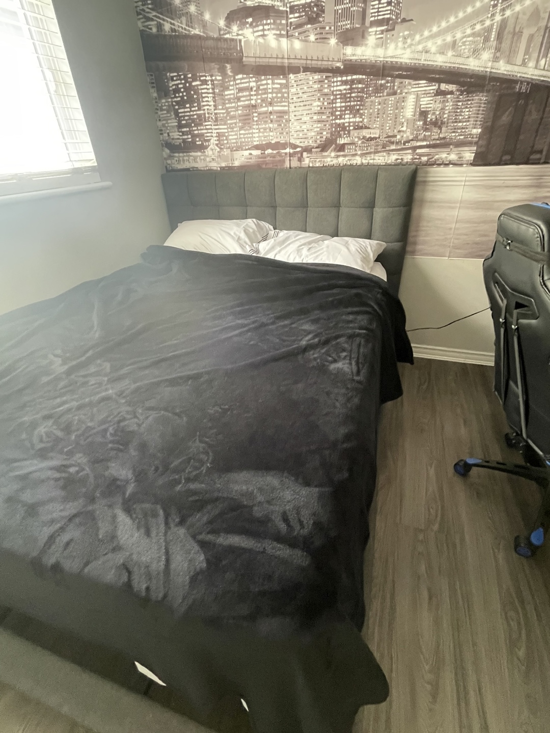 Grey upholstered queen bed frame with matching boxspring