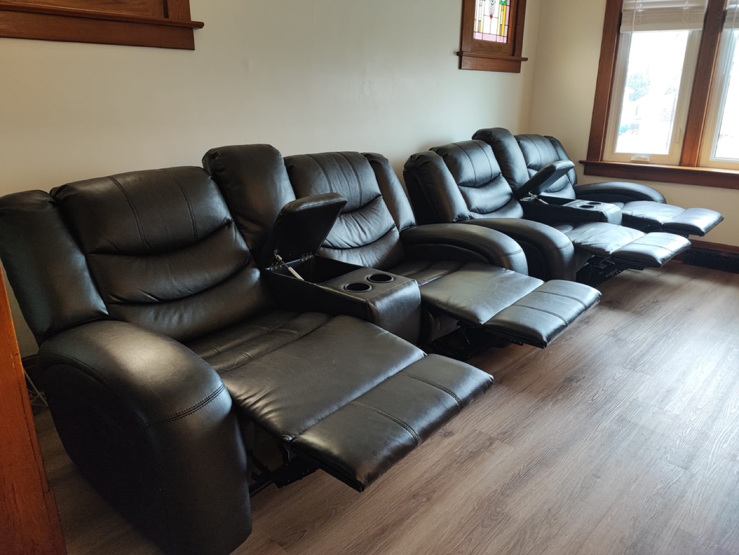 Four Brown Recliners