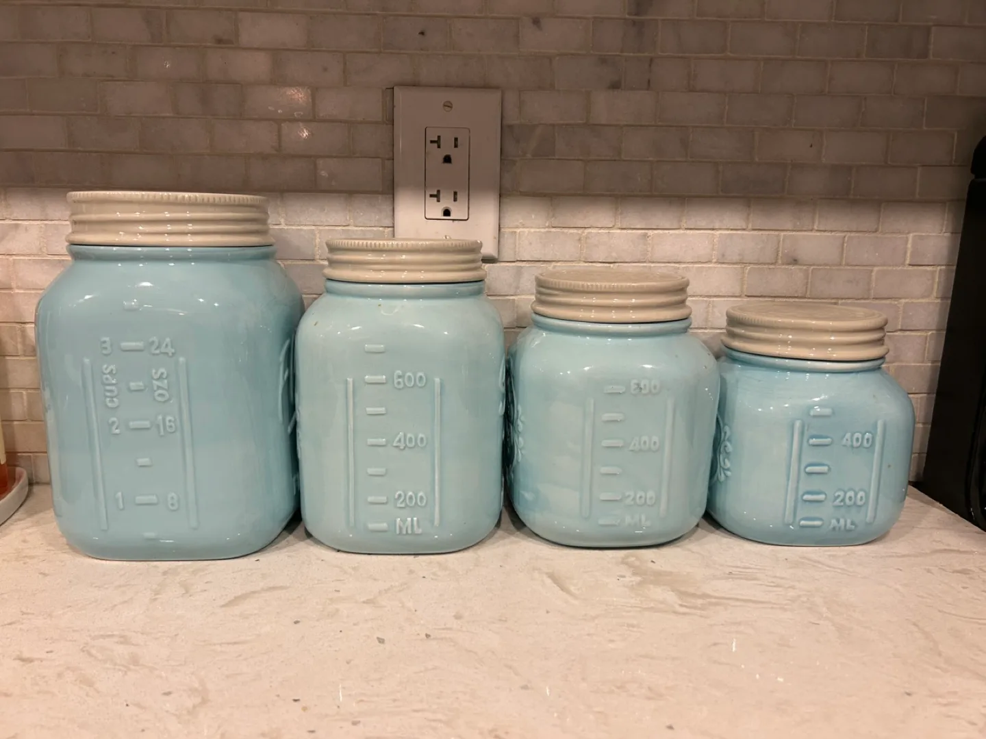 Set of four ceramic canisters image indicator(2)