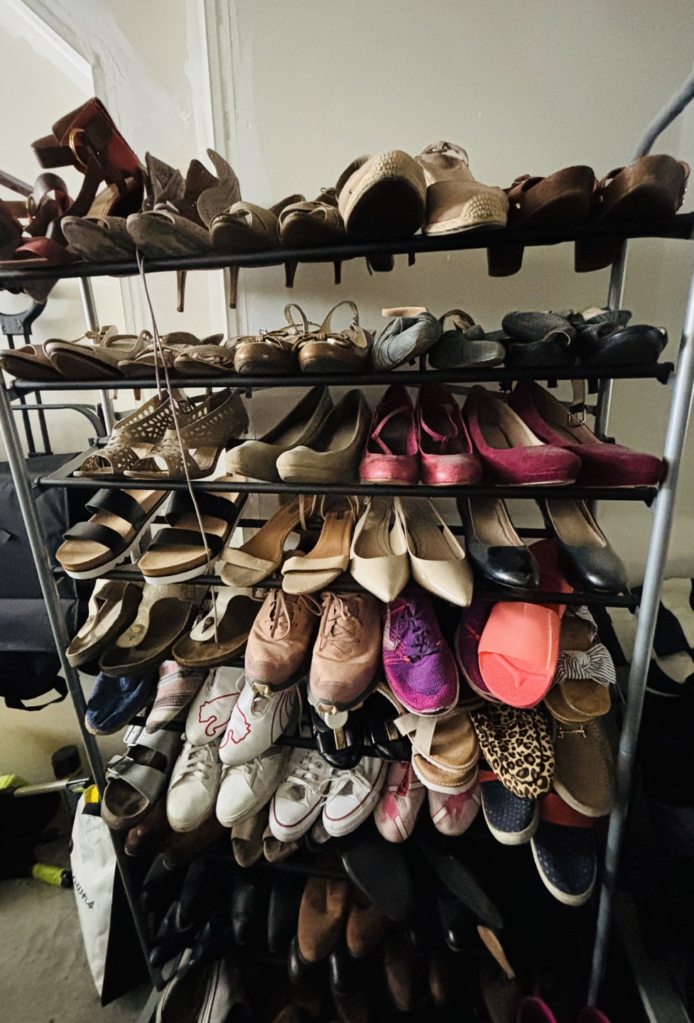 Shoe Rack holds 10 shelves of shoes