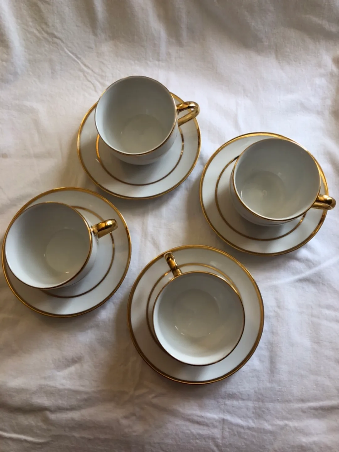Set of four Danica Monno porcelain  teacups and saucers image indicator(2)