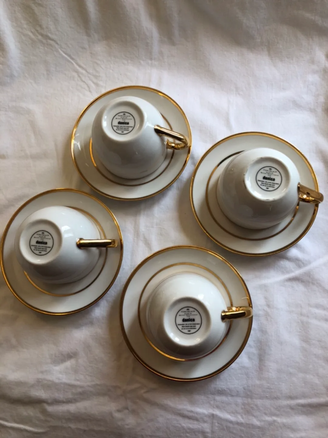 Set of four Danica Monno porcelain  teacups and saucers image indicator(3)