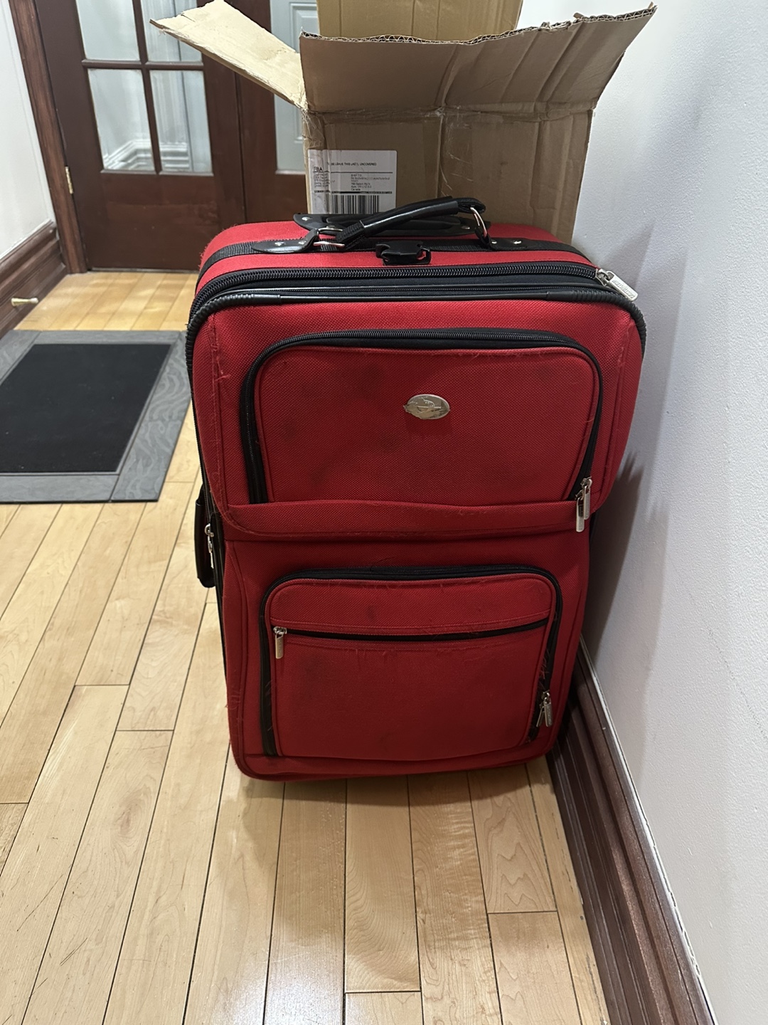 Red Rolling Suitcase