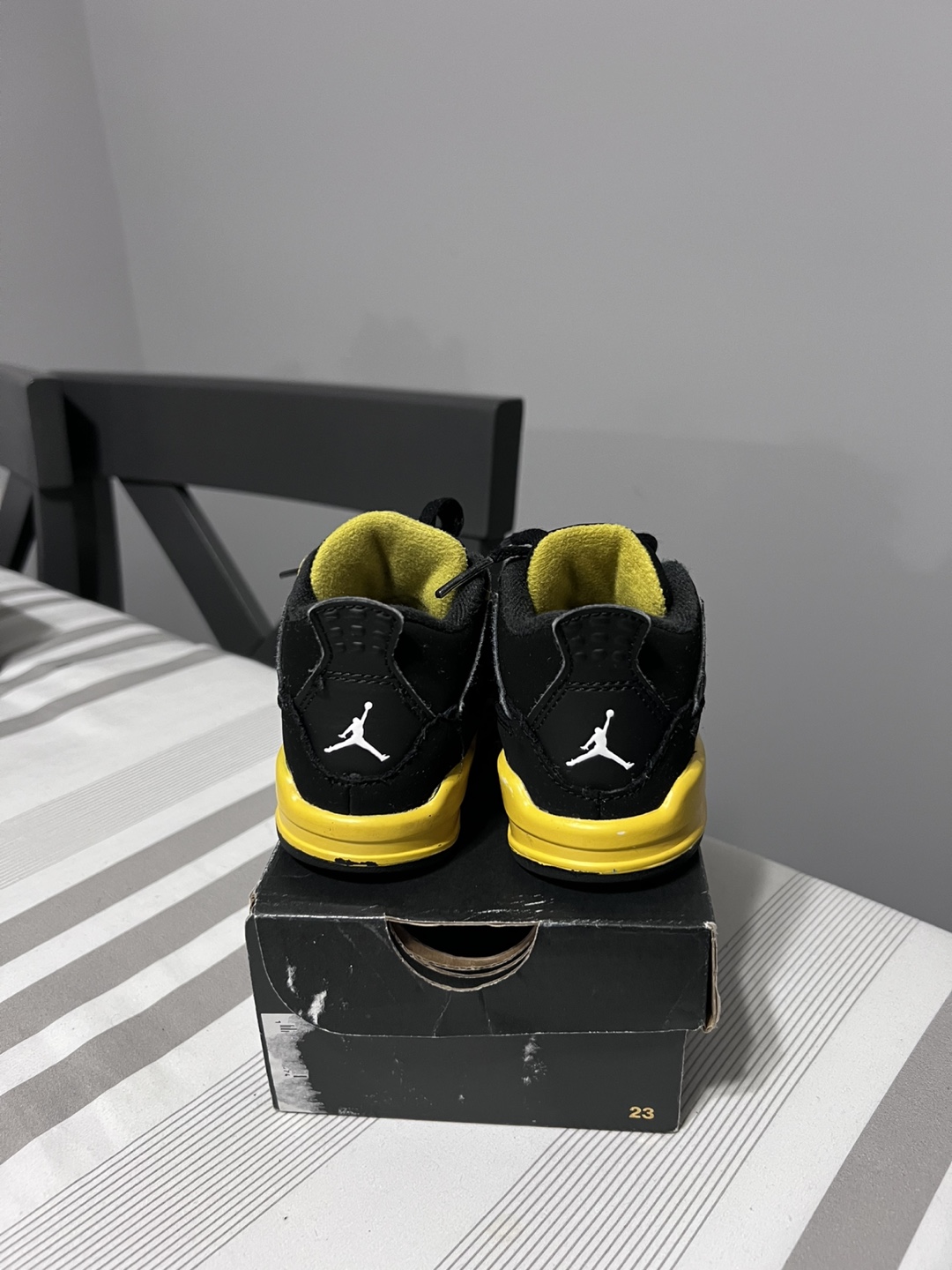Air Jordan 4 Retro Toddler Shoes - Black & Yellow