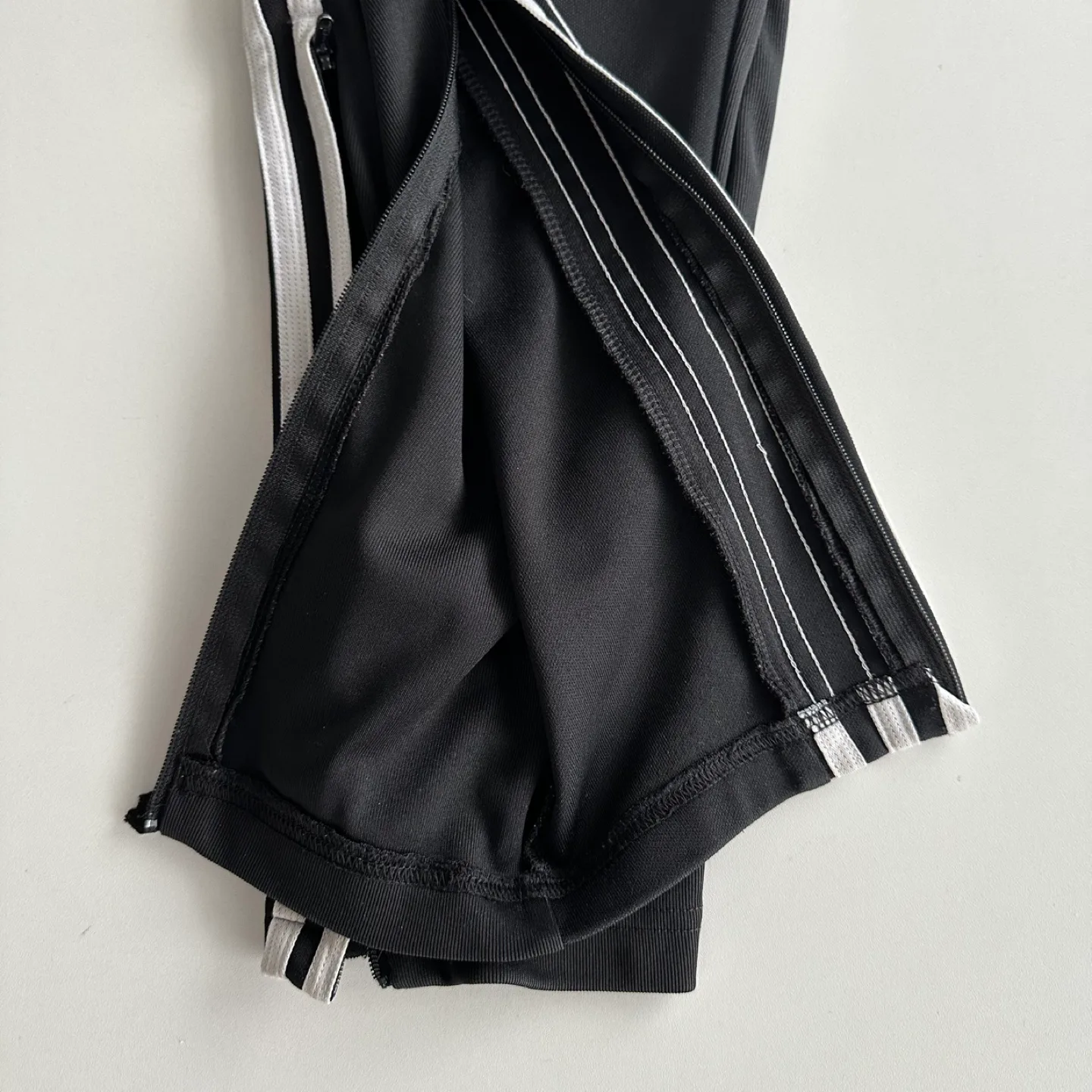 Adidas Women’s Black Track Pants White Stripes Zip Ankle Medium image indicator(10)