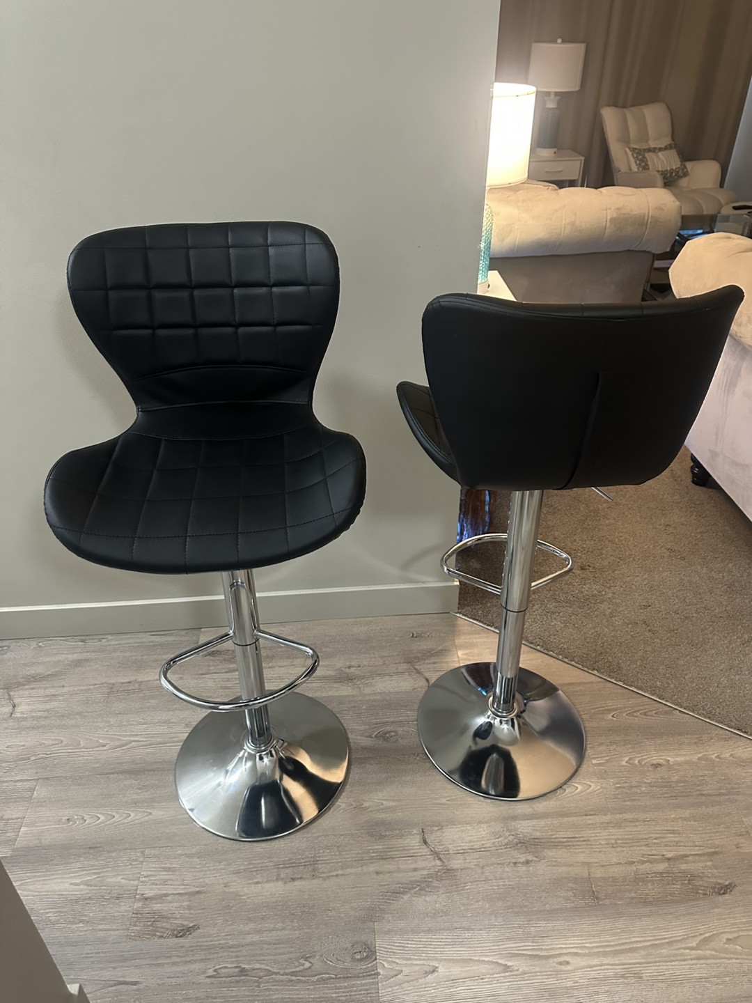 Brand-new set of two HOMCOM adjustable-height swivel bar stools.