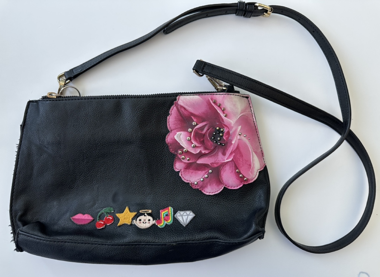 Black crossbody bag with colourful appliqués