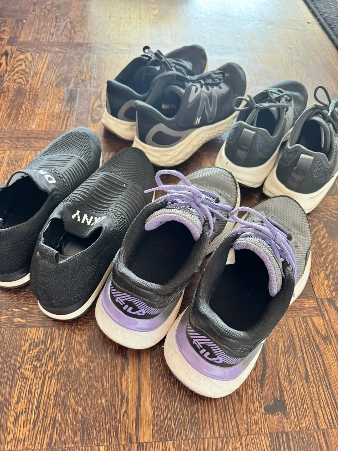 Four pairs of women's running shoes thumbnail