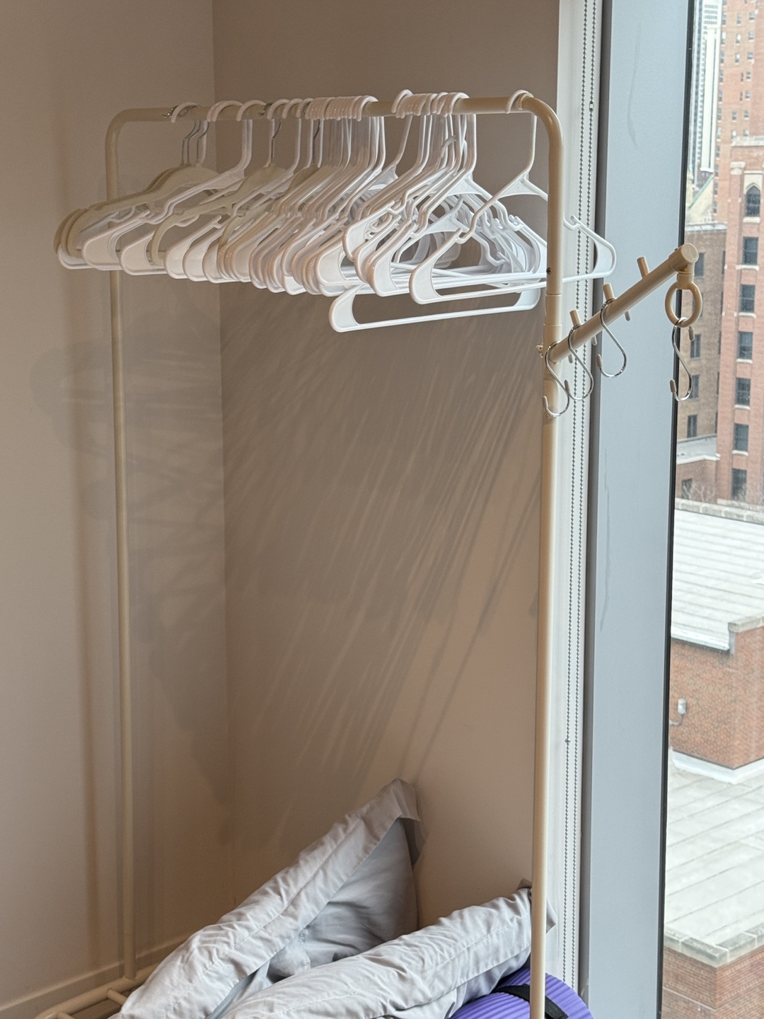 White Clothes Rack with Hangers