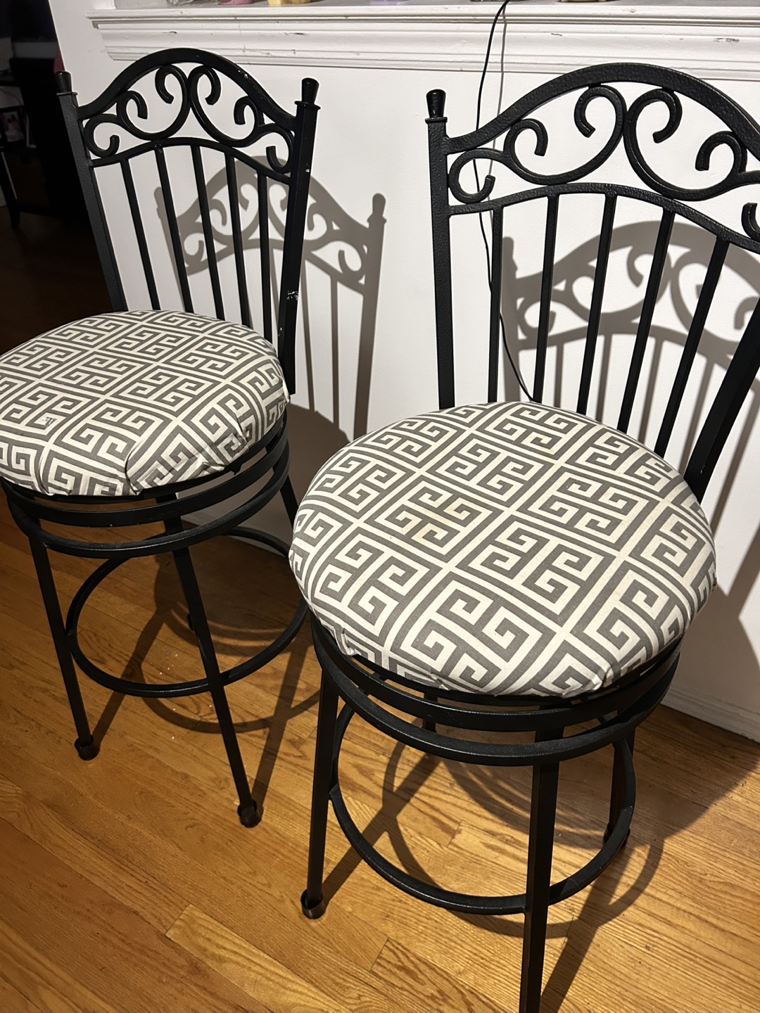 Pair of Black Metal Bar Stools with Greek Key Pattern Cushions