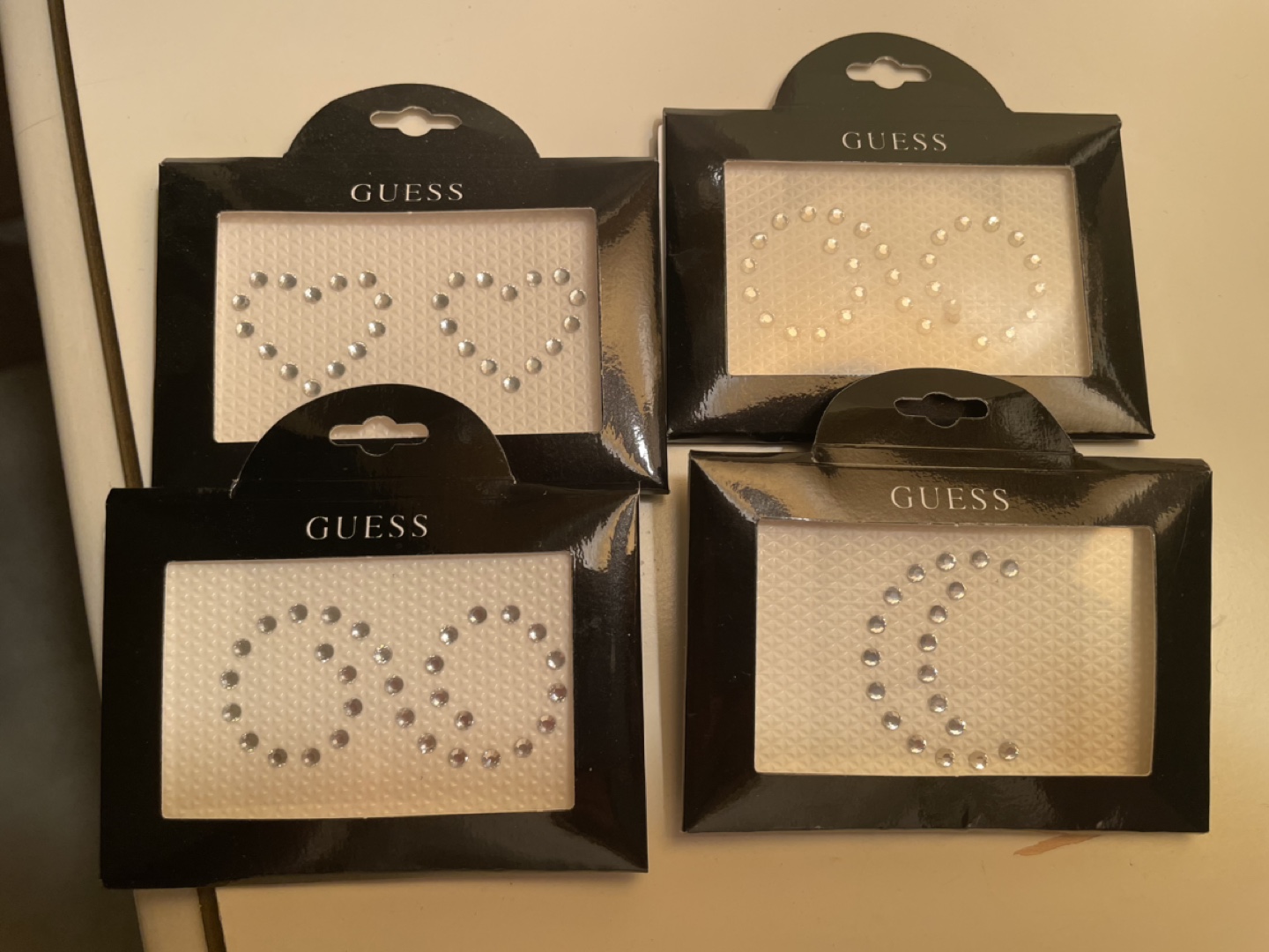 💚 Four packs of GUESS rhinestone embellishments